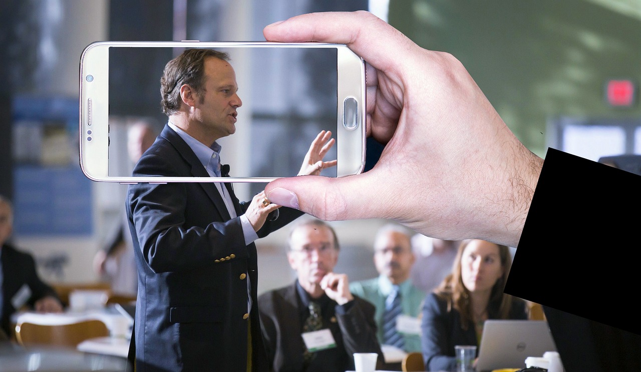 video recording, conference, public speaking, presentation, lecture, speaker, man, smartphone, screen, horizontal, technology, display, device, mobile, hand, holding, social media, business, live, communication, white, public speaking, public speaking, public speaking, public speaking, public speaking, lecture, speaker, speaker, speaker